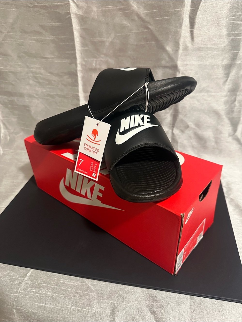 Nike Black Slide Sandals with White Swoosh Logo